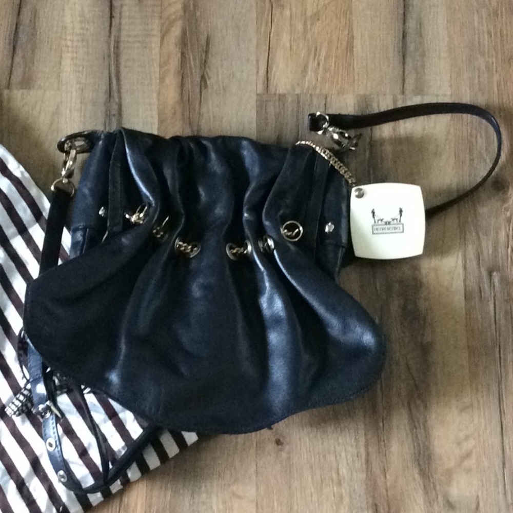 Beautiful Henri Bendel new without tags.
